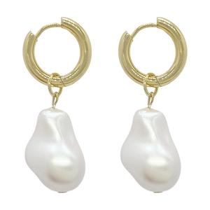 Detail of baroque pearl drop earrings featuring golden hoops and irregular white pearls