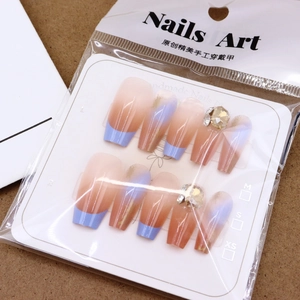 Purple gradient press-on nails with luxury rhinestones and golden foil accents