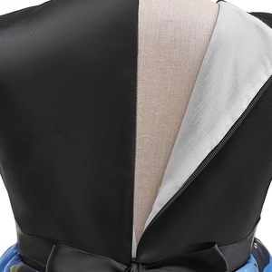 Detail of the back invisible zipper and black satin bow on girl's Halloween pumpkin dress