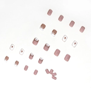 Matte press-on nails set featuring cute bear and rabbit cartoons in creamy pink and brown
