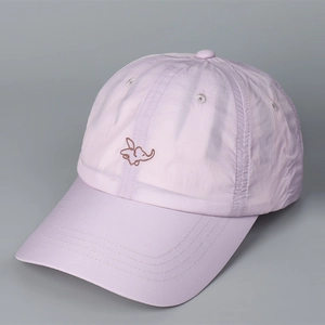 Detail of light purple baseball cap featuring embroidery and breathable quick-dry fabric
