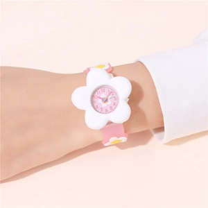 Pink kids quartz watch with white flower pattern dial and soft silicone strap