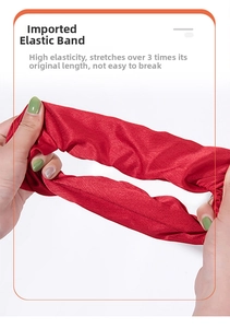 Detail showing the ultra-elastic red mulberry silk scrunchie with 3x stretch durability