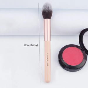 Detail view of 16.5cm flame-shaped makeup brush with soft dual-tone bristles and metal ferrule