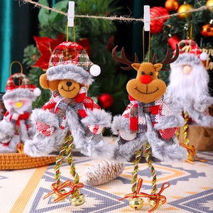 Christmas plush ornaments featuring reindeer and bear with festive bells and plaid hats