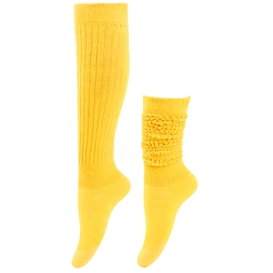 Detail of yellow knit slouch socks featuring ribbed texture and thick cable knit patterns