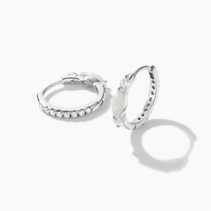 Close-up of S925 silver hoop earrings featuring marquise opal and round cubic zirconia