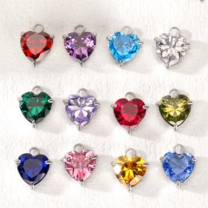Set of 12 heart-shaped birthstone charms with silver claw settings and colorful zircons