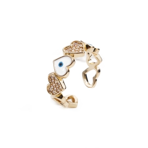 Detail of gold-plated heart ring with evil eye enamel and pavé zircon stones