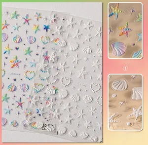 Detailed macro of 5D embossed nail stickers featuring colorful gradient starfish and shells