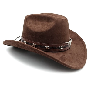 Detail of dark brown suede cowboy hat featuring leather band with silver bull head and studs
