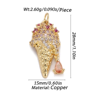 Detail view of a 28mm gold ice cream cone pendant with pink zirconia and copper material