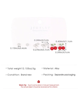 Detailed view of alloy summer fruit earring set featuring cherry and bow designs