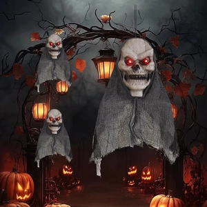 Hanging Halloween ghosts with glowing red LED eyes in a spooky forest setting
