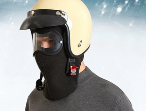 Close-up of winter fleece balaclava with integrated goggles and riding helmet