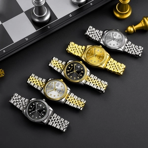 Detailed collection of quartz watches with calendar dials on a chess board background