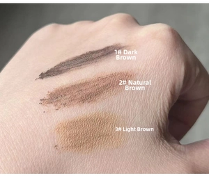 Micro shot of three waterproof eyebrow gel swatches in dark, natural and light brown