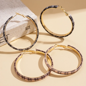 Chic plaid fabric wrapped gold circle hoop earrings in black and pink grid patterns