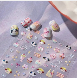 Detail of cute bunny and star nail art stickers with pastel macaron graffiti patterns