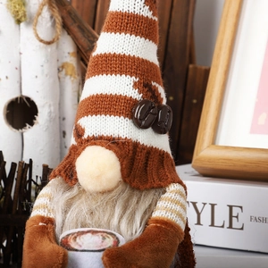 Detail of coffee gnome plush with knitted texture and faux fur beard for home decor