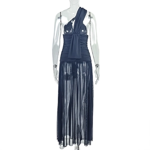 Detail of navy blue one-shoulder ruched dress with sheer mesh skirt and waist bow detail