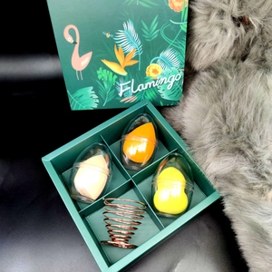 Makeup sponge set with blender holders in a green flamingo gift box packaging