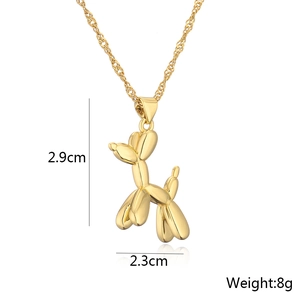 Detail view of 18K gold-plated balloon dog pendant with 2.9cm height and 2.3cm width dimensions