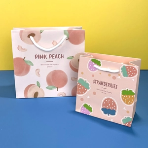 Premium DuPont paper gift bags featuring pink peach and colorful strawberry patterns