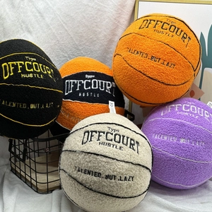 Plush basketball pillows in multiple colors with Offcourt Hustle embroidery