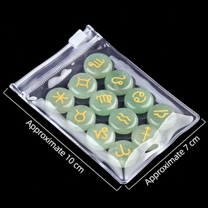 Natural green crystal 12 zodiac rune stones set with gold symbols in a poly bag
