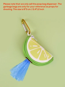 Detail of lemon-shaped pet waste bag dispenser with blue bag pulled out from canvas pouch