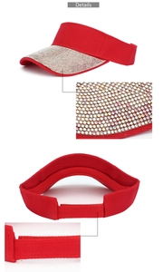 Detail view of red sun visor with rhinestones and adjustable hook-and-loop strap
