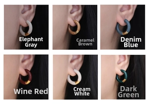 Model wearing French enamel hoop earrings in six autumn colors with 18k gold plating