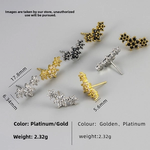 Macro shot of micro-paved zircon flower stud earrings with dimension measurements