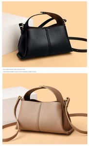 Close-up of litchi texture leather and golden metal buckles on stylish square handbags