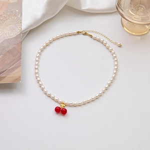 Fresh freshwater pearl cherry pendant necklace for women with elegant golden leaf accents
