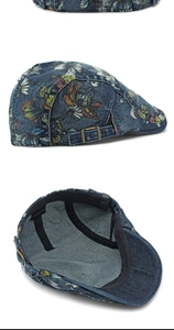 Detailed view of floral denim ivy cap with 100% cotton label and bronze side buckle