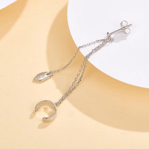 Detail of S925 sterling silver leaf tassel earring with chain link and ear cuff