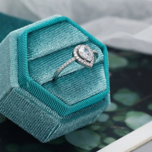 Sparkling S925 silver pear-shaped zircon ring in a luxury turquoise hexagonal velvet box