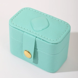 Waterproof mint green cross-grain leather jewelry box with a gold metal button