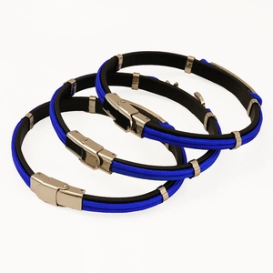 Detail view of navy and black braided anchor bracelets with silver stainless steel clasps