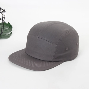 Detail showing high-quality cotton fabric and breathable metal eyelets on the charcoal five-panel hat