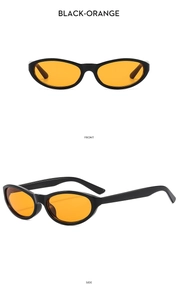 Front and side views of vintage cat eye sunglasses with black frames and orange lenses
