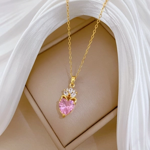 Luxurious gold titanium necklace with pink crown heart crystal in a gift box