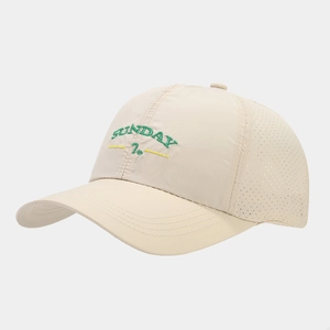 Close-up of beige breathable baseball cap with green SUNDAY embroidery and mesh vents