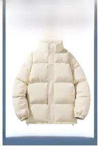 Macro detail of cream stand-collar puffer jacket with horizontal wide quilting