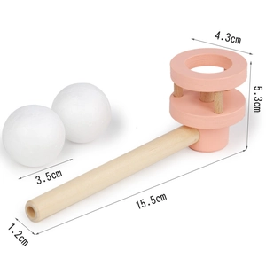 Detailed technical diagram showing dimensions of wooden floating ball toy and foam balls