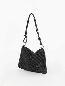 Close-up of black rhinestone hobo bag with knotted strap and sparkling geometric design