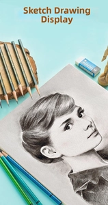 Detailed close-up of professional drawing pencils and a realistic portrait sketch