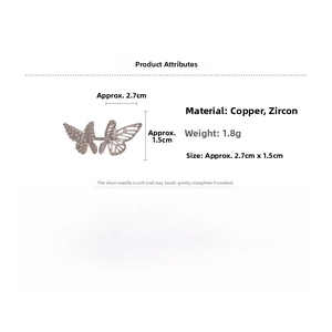 Detail view of zircon butterfly ear cuff with copper base and silver needle dimensions